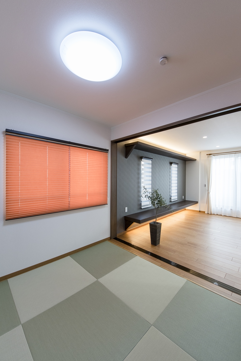 2F畳敷洋室(子世帯)／爽やかなグリーンの畳を市松敷きにしたモダンな空間。